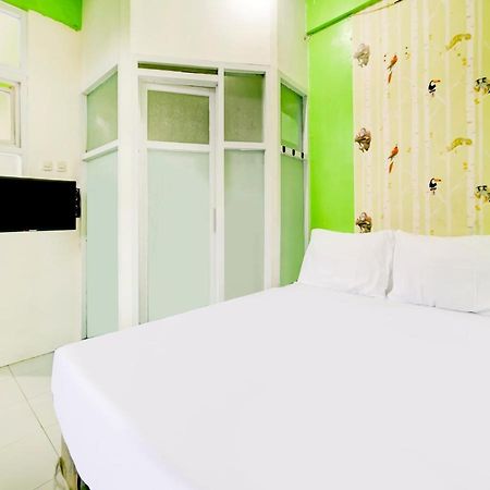 Oyo Life 3103 Opo Homestay & Kost Malang Buitenkant foto