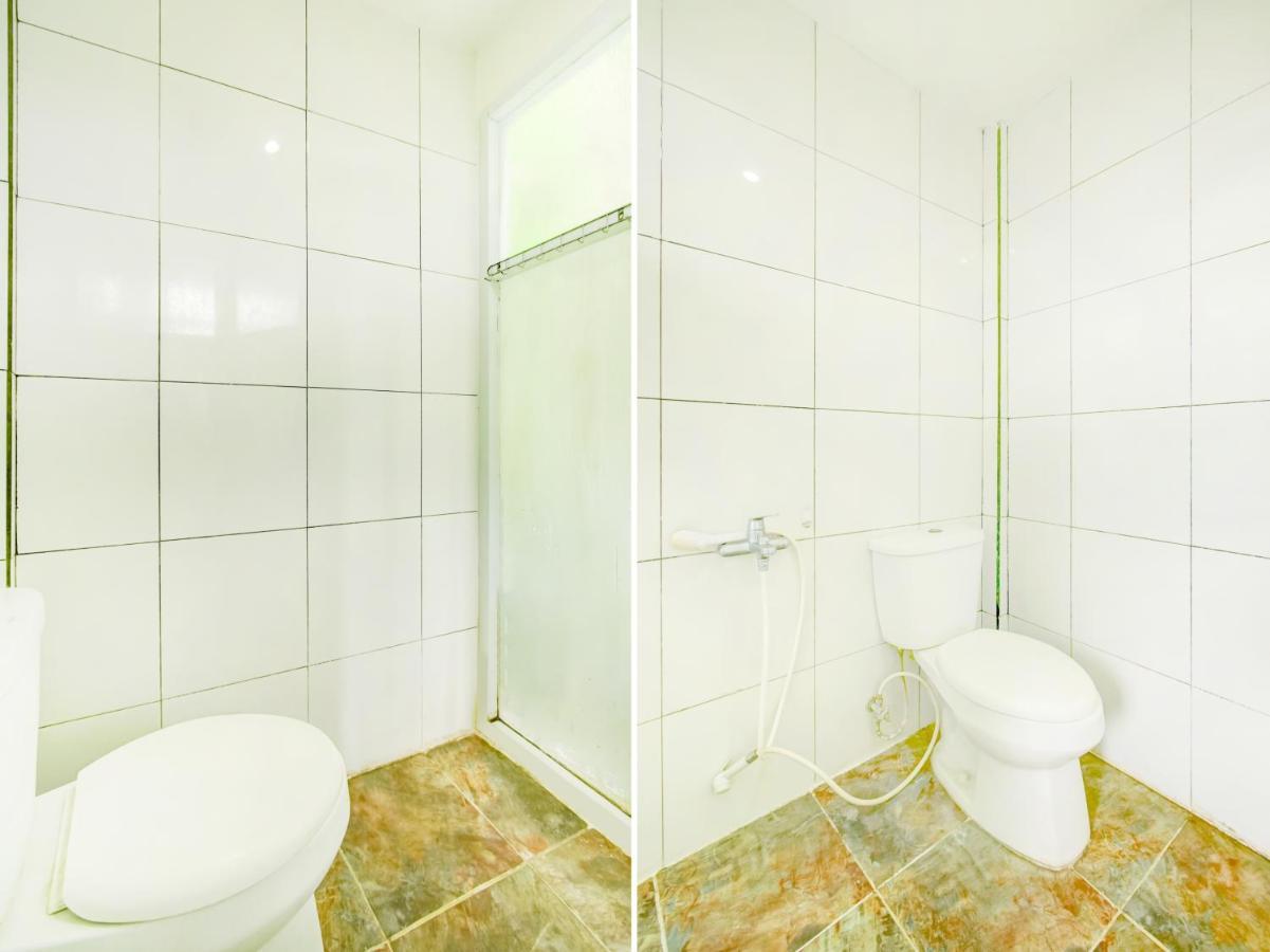 Oyo Life 3103 Opo Homestay & Kost Malang Buitenkant foto